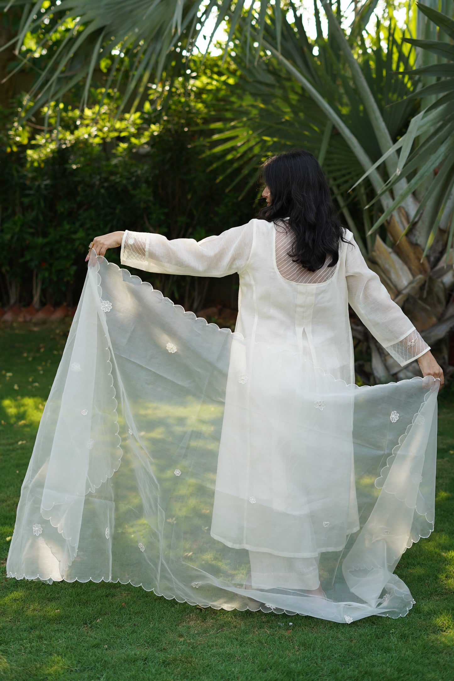 Chanderi kurta and pant with tucks yoke and embosed flower embroidery, organza scalloped flower emb.