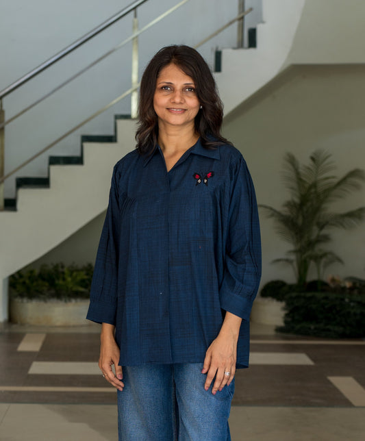 Shirt with embroidered butterfly