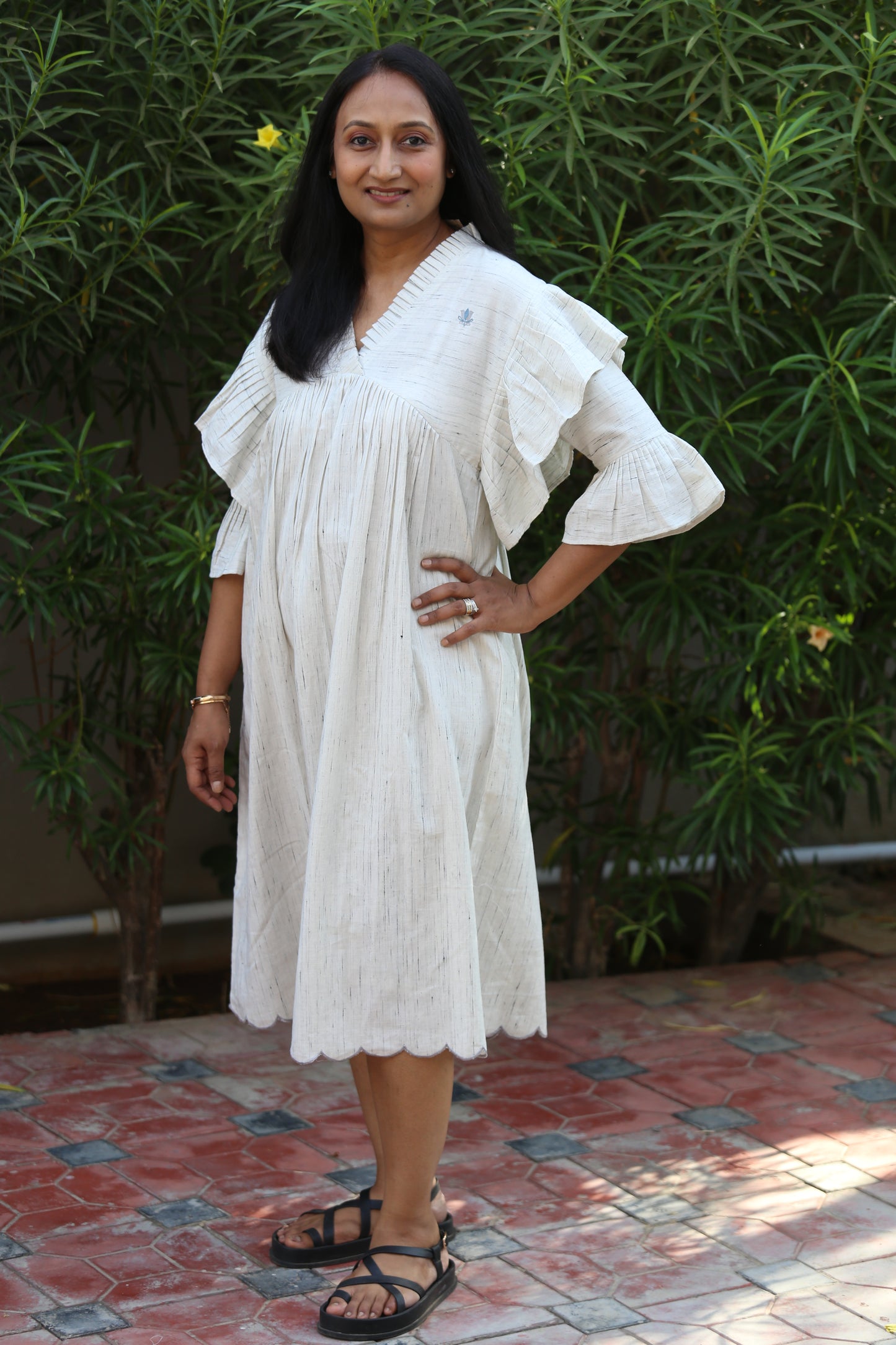Dress with ruffled sleeves
