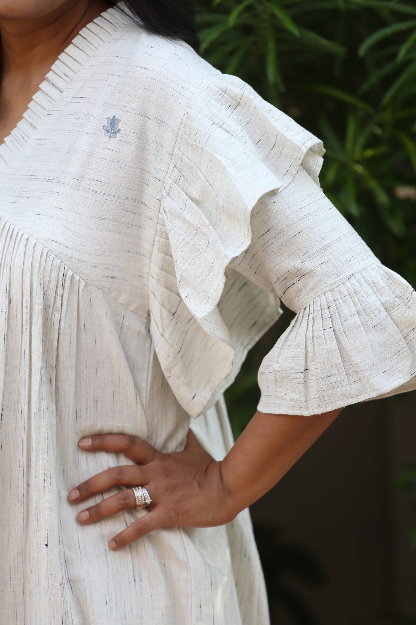 Dress with ruffled sleeves