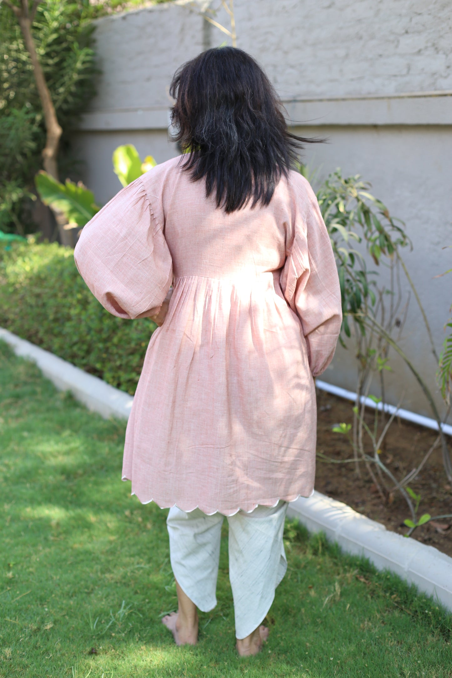 Top with scallops and neck line detailing
