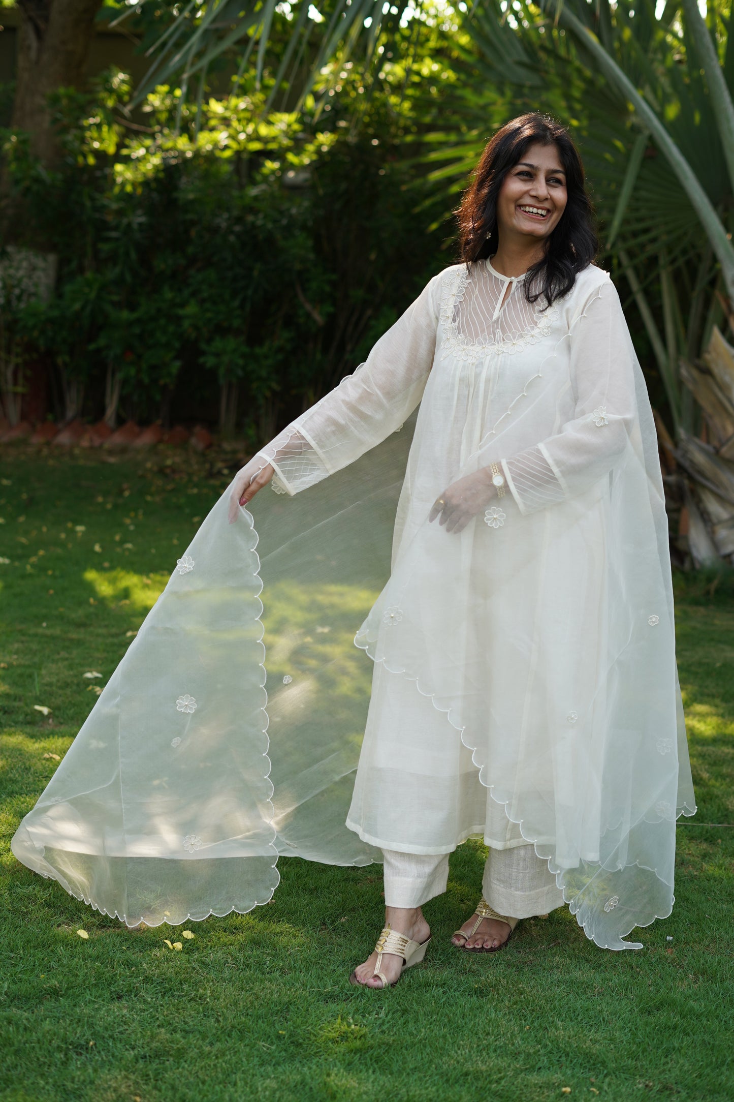 Chanderi kurta and pant with tucks yoke and embosed flower embroidery, organza scalloped flower emb.